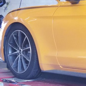 BFS Performance - Was 3 level fingers high in front,  now one finger gap almost level with stock 19" P Zeros. Steering wheel turns lock to lock, no rubbing. - Auto Repair Near Me - Houston, Texas
