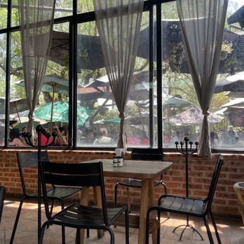 Las Moras - Indoor seating, and a view of have outside seating - Breakfast & Brunch Near Me - León, GUA Las Moras - Indoor seating, and a view of have outside seating - Breakfast & Brunch Near Me - León, GUA