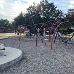 Rose Haggar Park - Climbing playground and bench