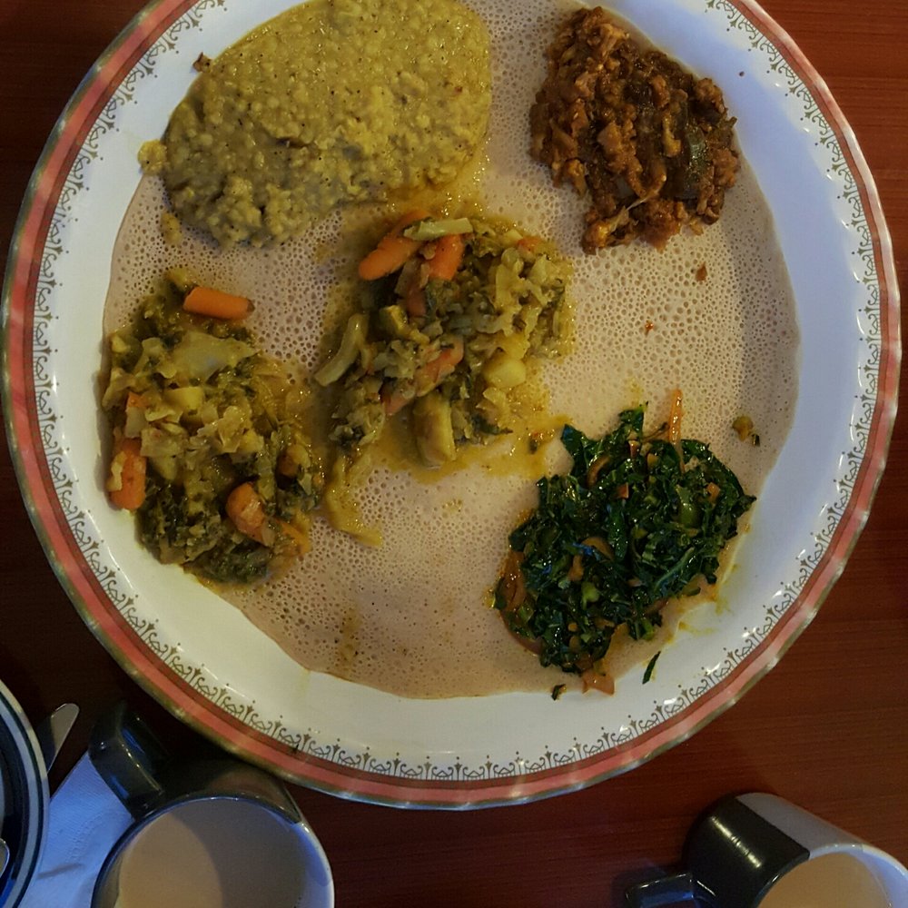 Fatima's Cafe - Vegetarian Platter with eggplant,  collared greens,  lentils,  and vegetable stew.  It tastes as good as it looks! - African Near Me - Worcester, Massachusetts