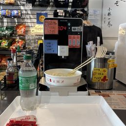 Ramen making station with clear instructions next to the machine Ramen making station with clear instructions next to the machine