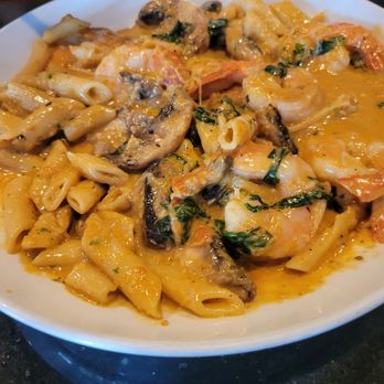 Amicci's - Sundried tomatoe pesto sauce over penne with shrimp - Italian Near Me - Baltimore, Maryland Amicci's - Sundried tomatoe pesto sauce over penne with shrimp - Italian Near Me - Baltimore, Maryland