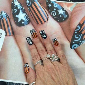 Ardora Nail Lounge - Brought the photo to the artist and was given an exact, freehand replica.  Amazing - Nail Salons Near Me - Silverdale, Washington