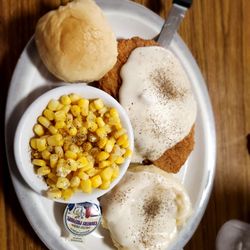 Longford Coachlight Restaurant - Smothered chicken fried steak, msshed potatoes, corn, and homemade roll.