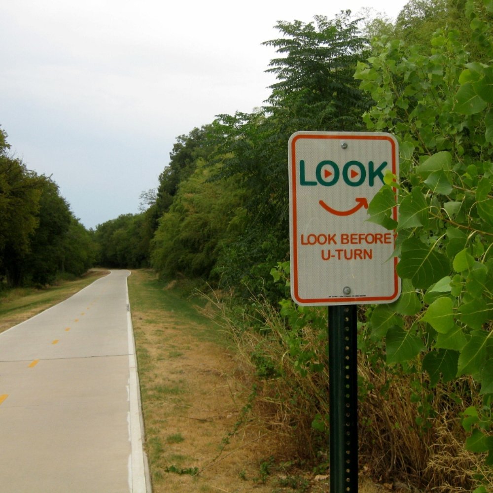 Santa Fe Trail - There are a variety of cute signs like this along the trail - each with their own message about trail etiquette - Parks Near Me - Dallas, Texas