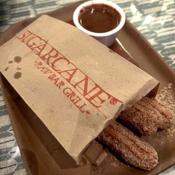 Sugarcane - Warm Cinnamon & surges churros - too doughy (wasn't all the way done) - Cocktail Bars Near Me - Las Vegas, Nevada Sugarcane - Warm Cinnamon & surges churros - too doughy (wasn't all the way done) - Cocktail Bars Near Me - Las Vegas, Nevada