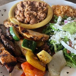 Lunch portion of fajitas, steak and chicken Lunch portion of fajitas, steak and chicken