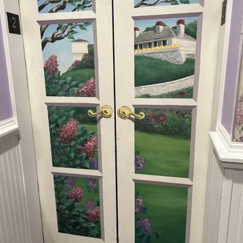 Lilac Tree Suites & Spa - The elevator doors are painted and beautiful - Hotels Near Me - Mackinac Island, Michigan Lilac Tree Suites & Spa - The elevator doors are painted and beautiful - Hotels Near Me - Mackinac Island, Michigan