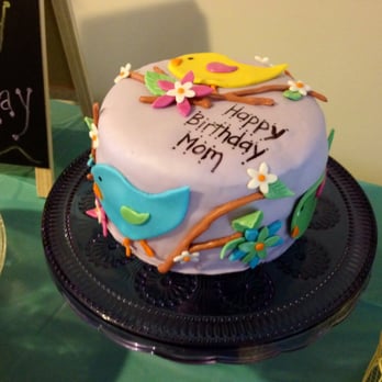 Sorella Sweets - a birthday cake on a table - Bakeries Near Me Sorella Sweets - a birthday cake on a table - Bakeries Near Me