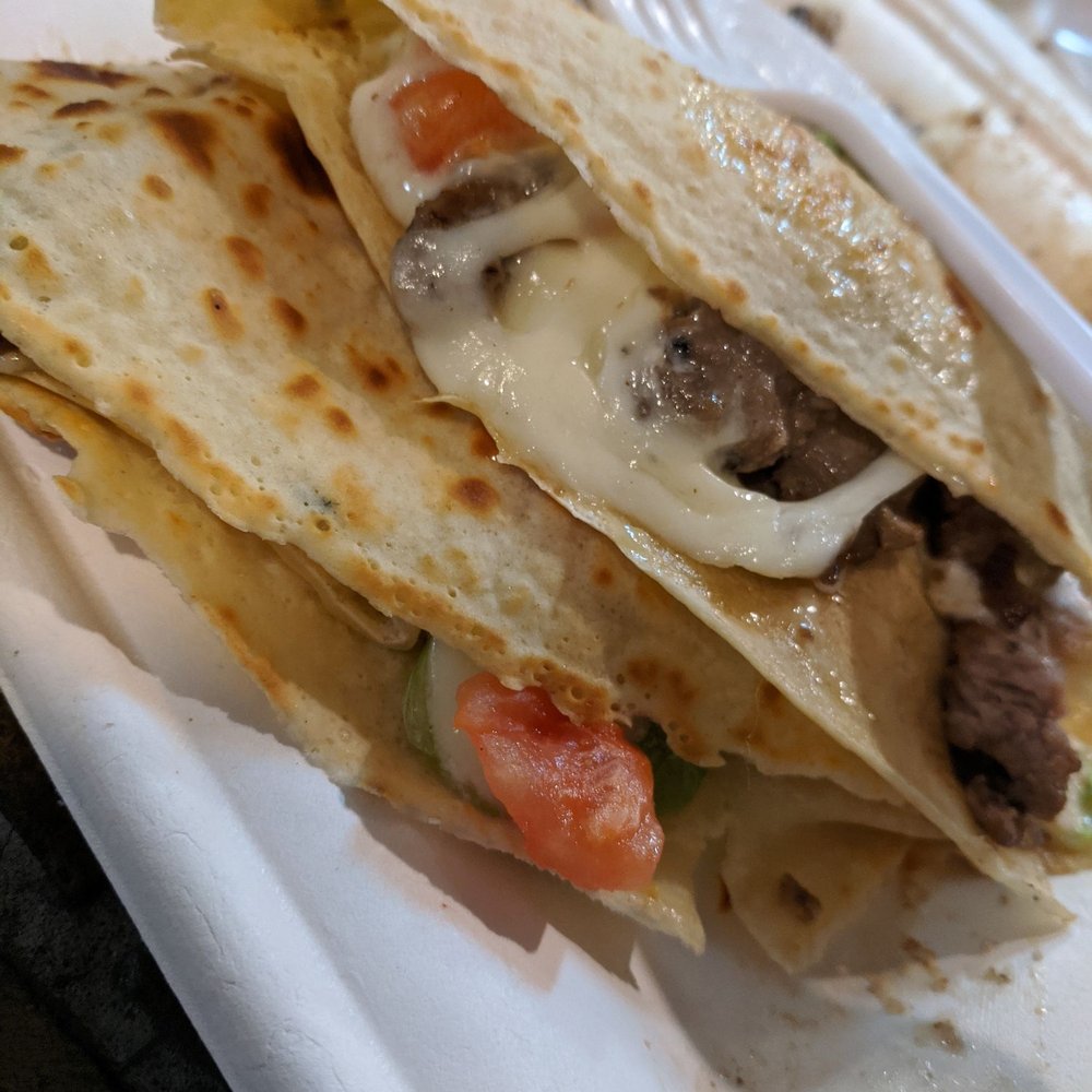 The Fieldhouse: Steak, Garlic Aioli, Provolone, Tomato, and Lettuce