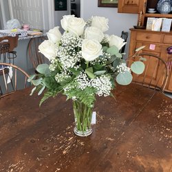 Dozen white roses