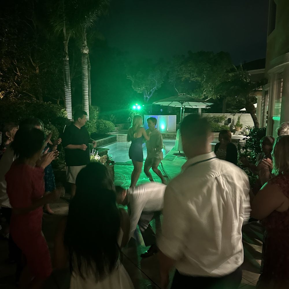 DJ Inky Entertainment - DJ Inky making a small wedding reception rock - Photo Booth Rentals Near Me