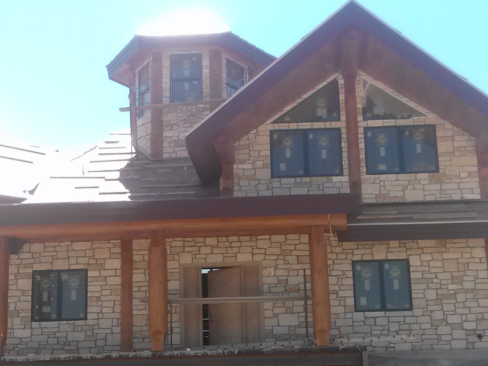 Slide of Hackett's Custom Siding and Metal Roofs