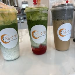 Matcha latte w/egg custard foam, strawberry matcha latter with Sea Salt vanilla cold foam and moon latte with black sesame cold foam.