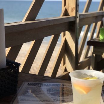 High Tides At Snack Jack - White Sangria before dinner on the back deck - Seafood Near Me - Flagler Beach, Florida High Tides At Snack Jack - White Sangria before dinner on the back deck - Seafood Near Me - Flagler Beach, Florida