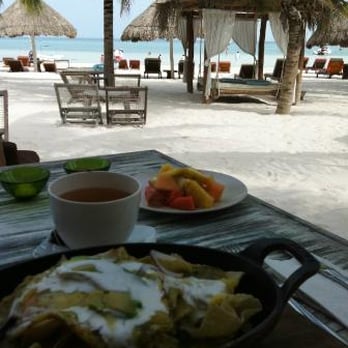 Mandarina Restaurant - By the way I stole this pic from the internets, but its funny that it shows the view and chilaquiles (in green sauce not red) - Mediterranean Near Me - Holbox, ROO Mandarina Restaurant - By the way I stole this pic from the internets, but its funny that it shows the view and chilaquiles (in green sauce not red) - Mediterranean Near Me - Holbox, ROO