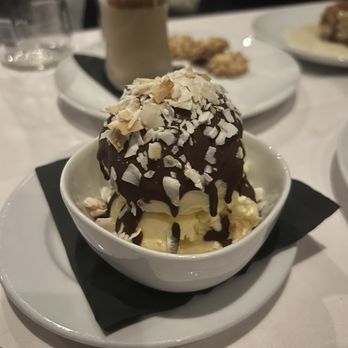 Craig's - Snowball - vanilla ice cream, house made magic shell chocolate, toasted coconut - American Near Me - West Hollywood, California Craig's - Snowball - vanilla ice cream, house made magic shell chocolate, toasted coconut - American Near Me - West Hollywood, California