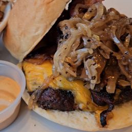 Customized Cheeseburger with caramelized onions and bacon