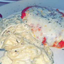 Chicken Parmesan with Alfredo sauce on the noodles instead of marinara. Chicken Parmesan with Alfredo sauce on the noodles instead of marinara.