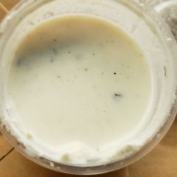 Peshawar - a close up of a cup of milk - Indian Near Me - Greenfield, Wisconsin