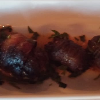 CRāVing Restaurant - Stuffed Dates - stuff with chorizo, wrapped in bacon with romesco sauce - New American Near Me - Buffalo, New York CRāVing Restaurant - Stuffed Dates - stuff with chorizo, wrapped in bacon with romesco sauce - New American Near Me - Buffalo, New York