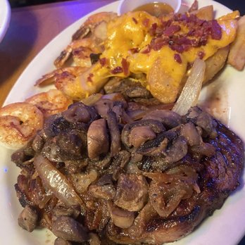 Texas Roadhouse - combo w 12 oz ribeye and shrimp and fries w cheese and bacon. - Steakhouses Near Me - Albany, New York Texas Roadhouse - combo w 12 oz ribeye and shrimp and fries w cheese and bacon. - Steakhouses Near Me - Albany, New York