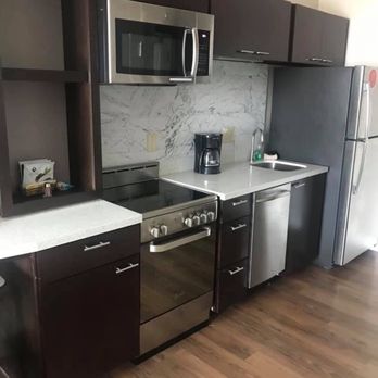 TownePlace Suites By Marriott - Kitchen area - Hotels Near Me - Baytown, Texas TownePlace Suites By Marriott - Kitchen area - Hotels Near Me - Baytown, Texas