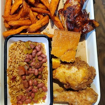 Firefly's BBQ - 2 meat combo: bbq chicken and fried chicken with sweet potato fries and red bean dirty rice - Barbeque Near Me - Marlborough, Massachusetts Firefly's BBQ - 2 meat combo: bbq chicken and fried chicken with sweet potato fries and red bean dirty rice - Barbeque Near Me - Marlborough, Massachusetts