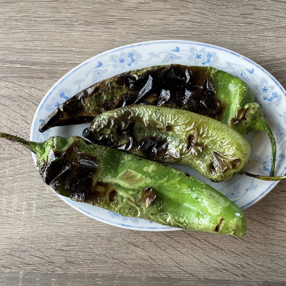 The Kitchen - Roasted Anaheim peppers, sea salt and garlic oil ($9.00) - Basque Near Me - Penticton, British Columbia The Kitchen - Roasted Anaheim peppers, sea salt and garlic oil ($9.00) - Basque Near Me - Penticton, British Columbia