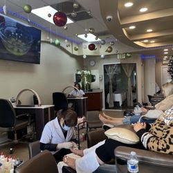 Nail and Spa - Spa chairs, bathroom, nail setup, and massage room.