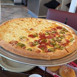 Joe's Pizza & Italian Grill - Alfredo cheese pizza with jalapeños and pepperoni on half