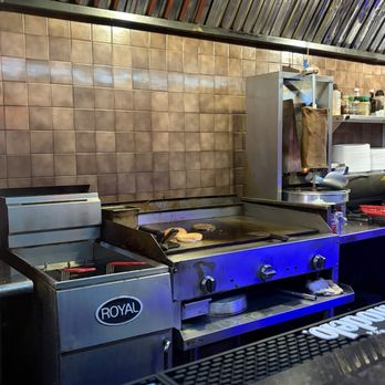 Snickers Bar & Grill - Kitchen behind the bar - Dive Bars Near Me - Chicago, Illinois Snickers Bar & Grill - Kitchen behind the bar - Dive Bars Near Me - Chicago, Illinois