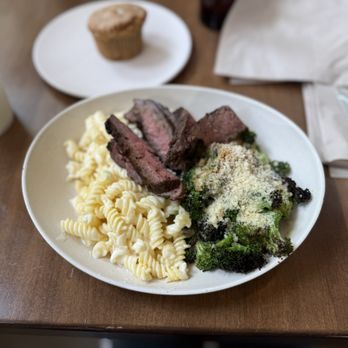 Flower Child - Steak, Gluten-Free Mac & Cheese, Roasted Broccoli, Lemon Olive Oil Cake - Salad Near Me - Houston, Texas Flower Child - Steak, Gluten-Free Mac & Cheese, Roasted Broccoli, Lemon Olive Oil Cake - Salad Near Me - Houston, Texas