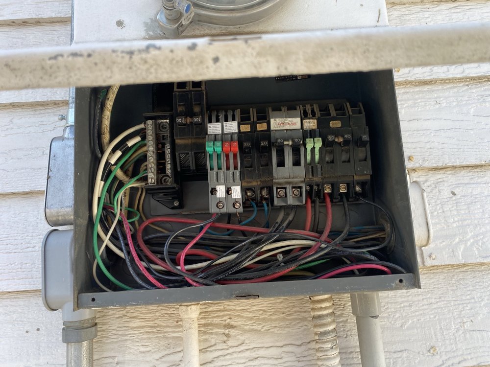 Slide of Gus's Electrical Services