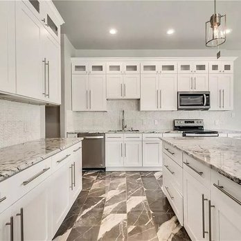 Lode - a kitchen with white cabinets and marble countertops - Kitchen & Bath Near Me - Dallas, Texas Lode - a kitchen with white cabinets and marble countertops - Kitchen & Bath Near Me - Dallas, Texas