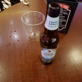 Tlur P'a Lounge - a bottle of beer and a glass on a table - Lounges Near Me - Albuquerque, New Mexico