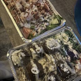 Left is chicken and rice and right is falafel and rice
