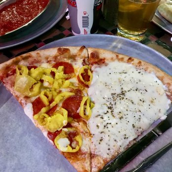 Fellini's Pizza - Slice of Pepperoni/Banana Pepper and a slice of the White Pizza - Pizza Near Me - Atlanta, Georgia Fellini's Pizza - Slice of Pepperoni/Banana Pepper and a slice of the White Pizza - Pizza Near Me - Atlanta, Georgia