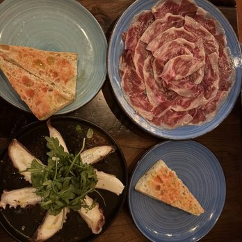La Rambla Usa - El beso Iberico (Jamon/cured ham), octopus, tomato and olive oil bread - Spanish Near Me - Tomball, Texas La Rambla Usa - El beso Iberico (Jamon/cured ham), octopus, tomato and olive oil bread - Spanish Near Me - Tomball, Texas