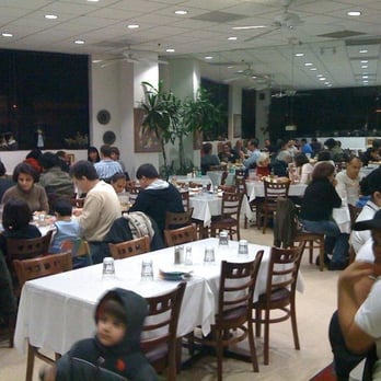 Shamshiry - Medium sized dining area looks bigger with the mirrors along the walls. - Middle Eastern Near Me - Vienna, Virginia