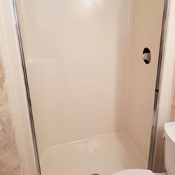 Daytona Tub and Tile - Fiberglass 2×2 shower with structural foam sprayed underneath and a resurface to last 10-15 years