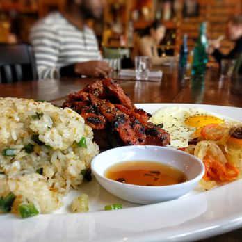 Nue - Filipino Tosilog -
Grilled Pork Tocino, Sinangag Garlic Fried Rice, Sunny-Side-Up Egg - Tapas/Small Plates Near Me - Seattle, Washington Nue - Filipino Tosilog -
Grilled Pork Tocino, Sinangag Garlic Fried Rice, Sunny-Side-Up Egg - Tapas/Small Plates Near Me - Seattle, Washington