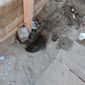 Unlimited Construction - This is a Frontier FiOS line they cut while digging to install post for a vinyl fence they placed. Clearly they do NOT call 811. - General Contractors Near Me