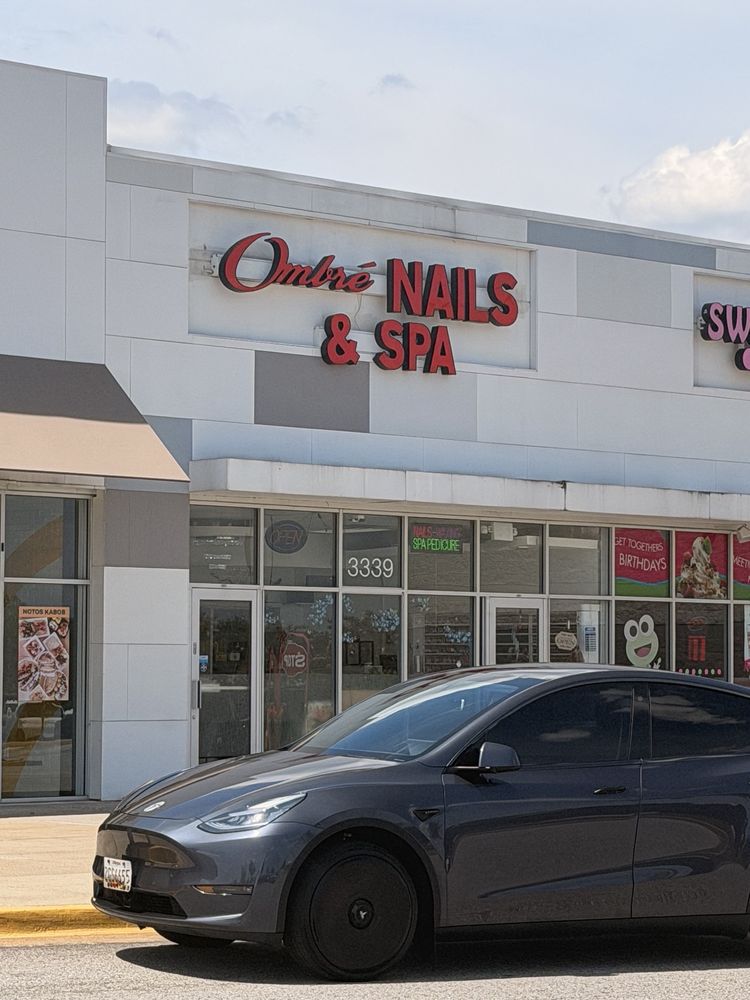 Ombre Nails & Spa Logo