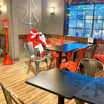 Coned Bros - tables and chairs in a restaurant - Beer Bar Near Me - Leavenworth, Washington