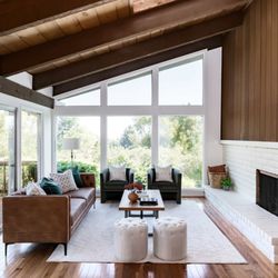 Sunwest Painting - Interior painting of a family room. Staining on wood paneling.