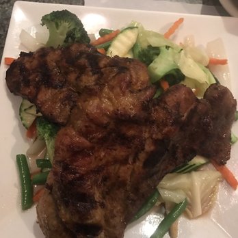 Green Basil - Grilled pork chops over vegetables. Very good! - Thai Near Me - North Providence, Rhode Island
