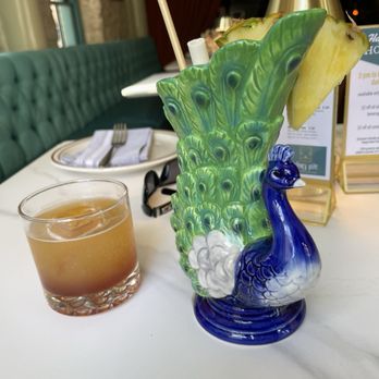Clay Pit - Old fashioned with passion fruit juice and Peacock bevvie - Indian Near Me - Austin, Texas Clay Pit - Old fashioned with passion fruit juice and Peacock bevvie - Indian Near Me - Austin, Texas