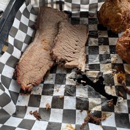 Wicked dry brisket. Excellent hush puppies