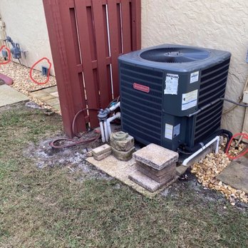 A N J Tree Service - Three more sprinkler heads right next to the building - Tree Services Near Me - mims, Florida